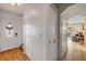 Bright entryway with coat closet leading to sunlit rooms with tile floors at 2510 S Atlantic Ave, New Smyrna Beach, FL 32169