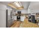 Well-equipped kitchen with stainless steel appliances, granite counters, and ample storage space at 2510 S Atlantic Ave, New Smyrna Beach, FL 32169