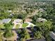Landscaped homes from above offer a green and lush environment in a quiet neighborhood at 257 Sweet Bay Dr, New Smyrna Beach, FL 32168