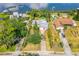 Aerial view of the property showing its proximity to the water and surrounding neighborhood at 2576 Sunset Dr, New Smyrna Beach, FL 32168