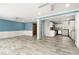 Bright and open living room and kitchen combination, creating an easy flow to move about at 2576 Sunset Dr, New Smyrna Beach, FL 32168