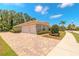 Spacious three-car garage and paver driveway add to the appeal of this lovely home at 260 Portofino Blvd, New Smyrna Beach, FL 32168