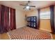 Spacious bedroom with natural light, complemented by modern accents and a ceiling fan for added comfort at 2714 Yule Tree Dr, Edgewater, FL 32141