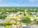 Location aerial view showcasing its position in a neighborhood with beautiful green trees and nearby houses at 2726 Victory Palm Dr, Edgewater, FL 32141