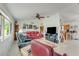 Comfortable living room featuring tile floors, ceiling fan and view into the kitchen at 2726 Victory Palm Dr, Edgewater, FL 32141