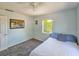 Comfortable bedroom featuring natural light and simple decor, creating a serene atmosphere at 2802 English Dr, Deltona, FL 32738