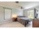 Bedroom features a neutral color scheme and natural light from window at 306 Jefferson Ave, Port Orange, FL 32127
