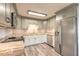 Bright kitchen with stainless steel appliances, ample storage, and modern countertops at 306 Jefferson Ave, Port Orange, FL 32127