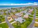 Gorgeous aerial view of a coastal community with beach access and lush landscaping near the Intercoastal waterway at 31 E Sea Harbor, Ormond Beach, FL 32176