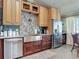 Well-equipped kitchen with stainless steel appliances, custom cabinets, and plenty of counter space at 31 E Sea Harbor, Ormond Beach, FL 32176