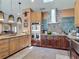 Gourmet kitchen with granite countertops, stainless steel appliances, and custom cabinetry at 31 E Sea Harbor, Ormond Beach, FL 32176