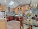 Chef's kitchen featuring custom cabinetry, a stainless steel hood, and ample counter space at 31 E Sea Harbor, Ormond Beach, FL 32176