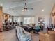 Inviting living room with tile floors, ceiling fan, and direct access to outdoor living spaces at 31 E Sea Harbor, Ormond Beach, FL 32176