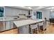 Well-appointed kitchen with a large island, stainless steel appliances, and ample cabinet space at 315 Sweet Bay Ave, New Smyrna Beach, FL 32168