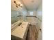 Bathroom featuring a bathtub, toilet, vanity, and a framed mirror at 3303 Victory Palm Dr, Edgewater, FL 32141