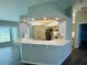 Modern kitchen featuring white countertops, gray cabinets, stainless steel appliances, and open layout at 3303 Victory Palm Dr, Edgewater, FL 32141