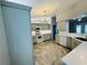 A fully updated kitchen featuring stainless steel appliances, modern countertops, and ample cabinet space at 3303 Victory Palm Dr, Edgewater, FL 32141