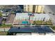 Aerial view of a condo building with a community pool and beach access at 3509 S Atlantic Ave # 102 And 103, New Smyrna Beach, FL 32169