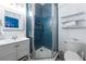 Modern bathroom features a glass shower and contemporary fixtures at 3509 S Atlantic Ave # 102 And 103, New Smyrna Beach, FL 32169