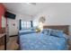 Comfortable bedroom features two beds, nautical decor, and a relaxing atmosphere at 3509 S Atlantic Ave # 102 And 103, New Smyrna Beach, FL 32169