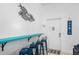 Coastal dining area features a bar with seating, beach-themed decor, and a bright, airy ambiance at 3509 S Atlantic Ave # 102 And 103, New Smyrna Beach, FL 32169