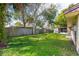 Spacious backyard with green grass and privacy, perfect for outdoor activities and relaxation at 3610 Donna St, Port Orange, FL 32129