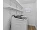 Laundry area with modern appliances and ample shelving space at 3610 Donna St, Port Orange, FL 32129