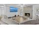 Open concept living room with a brick fireplace, neutral walls, and comfortable sectional seating at 3610 Donna St, Port Orange, FL 32129
