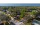An aerial view of the property showcasing its location within a lush, tree-filled neighborhood at 3736 Paige St, Port Orange, FL 32129
