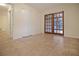 Bright room with tile flooring and glass paneled doors for great light and inviting living at 3736 Paige St, Port Orange, FL 32129