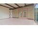 Relaxing covered patio featuring tile floors and brick accents, creating a comfortable outdoor space at 3736 Paige St, Port Orange, FL 32129