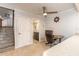 Entry area featuring stairs and a small office area with nautical decor at 3808 Saxon Dr, New Smyrna Beach, FL 32169