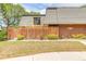Cozy single-Gathering home featuring a wood fence, and a well-manicured lawn at 3808 Saxon Dr, New Smyrna Beach, FL 32169