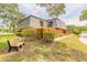 Charming two-story home with a fenced yard and inviting curb appeal at 3808 Saxon Dr, New Smyrna Beach, FL 32169