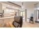 Open kitchen with stainless steel appliances and sliding glass doors to patio at 3808 Saxon Dr, New Smyrna Beach, FL 32169