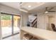 Bright eat-in kitchen with stainless appliances and sliding doors to a cozy patio at 3808 Saxon Dr, New Smyrna Beach, FL 32169