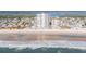 Stunning aerial view of a beachfront high-rise condo complex offering oceanfront living and relaxation at 3855 S Atlantic Ave # 1503, Daytona Beach Shores, FL 32118