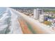 Beautiful aerial shot of a beachfront high-rise condo, highlighting ocean views and beach access at 3855 S Atlantic Ave # 1503, Daytona Beach Shores, FL 32118