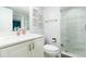 Modern bathroom featuring a marble countertop, framed decor, and a glass-enclosed shower for a luxurious experience at 3855 S Atlantic Ave # 1503, Daytona Beach Shores, FL 32118