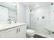 Bathroom features a vanity, toilet, and glass enclosed walk-in shower at 3855 S Atlantic Ave # 1503, Daytona Beach Shores, FL 32118