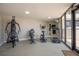 Fully equipped gym with weight machines, treadmill, and exercise equipment perfect for maintaining an active lifestyle at 3855 S Atlantic Ave # 1503, Daytona Beach Shores, FL 32118