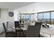 Open-concept living room featuring dining table, ocean views, and natural light at 3855 S Atlantic Ave # 1503, Daytona Beach Shores, FL 32118