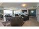 Open living room featuring floor-to-ceiling windows with ocean views at 3855 S Atlantic Ave # 1503, Daytona Beach Shores, FL 32118