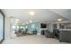 Large living area with ample seating, stylish decor, and a stunning ocean view at 3855 S Atlantic Ave # 1503, Daytona Beach Shores, FL 32118