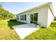 Spacious backyard and patio offers plenty of room for outdoor activities at 3963 Willowbrook Dr, Edgewater, FL 32141