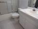 The bathroom features a combination tub and shower at 402 Bouchelle Dr # 205, New Smyrna Beach, FL 32169