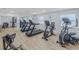 Modern community gym with treadmills, stationary bikes, and weightlifting equipment at 402 Bouchelle Dr # 205, New Smyrna Beach, FL 32169