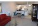 Inviting open-concept living space, blending dining, kitchen, and living areas seamlessly at 402 Bouchelle Dr # 205, New Smyrna Beach, FL 32169
