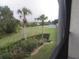 Enjoy lush green scenery outside your window from this amazing screened in porch at 402 Bouchelle Dr # 205, New Smyrna Beach, FL 32169