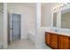Bright bathroom features double vanity, bath tub, and walk-in closet at 404 Central Mariners Dr, Edgewater, FL 32141